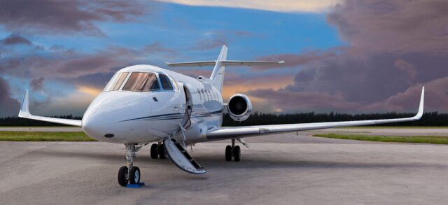 Private jet on the runway with the stair down